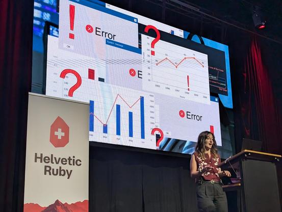 Yara Debian presenting on stage