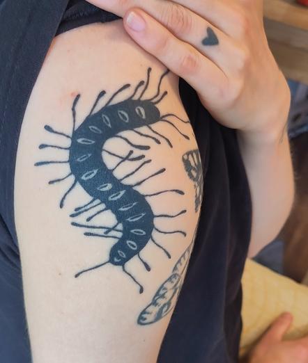 Centipede tattoo on shoulder