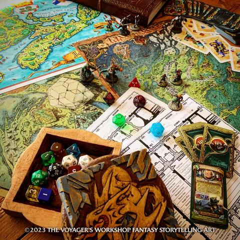 A busy tabletop with custom maps, a wood-carved dice box, free character sheets and more goodies grime the Voyager’s Workshop!