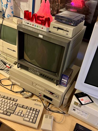 Photo of an Amiga 2000 system with various hardware devices sitting upon it