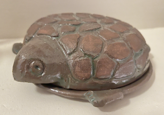 A ceramic turtle made by hand in Ethiopia.