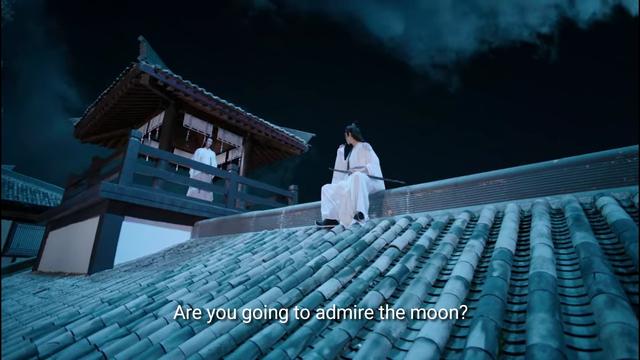 Teen Wei Wuxian sits on the apex of a roof, looking over at Lan Wangji standing in a guard post, and asks:

Are you going to admire the moon?