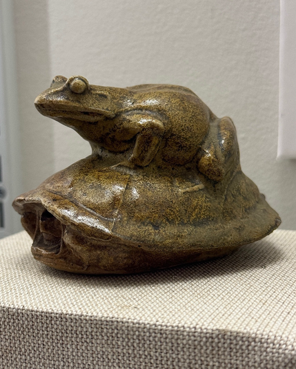 photo of the sculpture on display at museum, side view