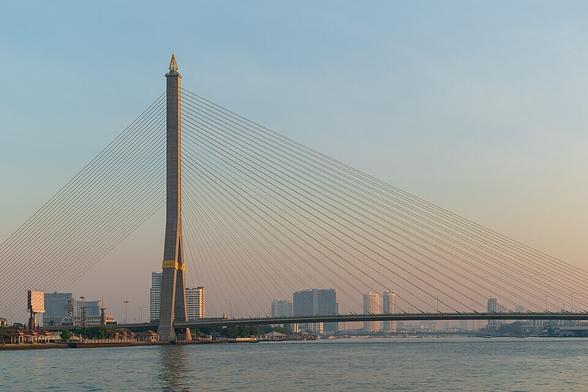 Rama VIII Bridge over the Chao Phraya River in Bangkok, Thailand, seen just after sunrise