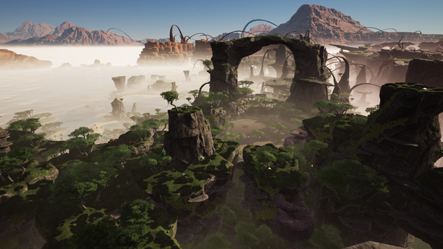 I arrived and beheld this scene of tropical forest around a giant stone arch formation.