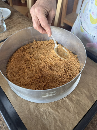 ...spreading out the Graham Cracker mix...