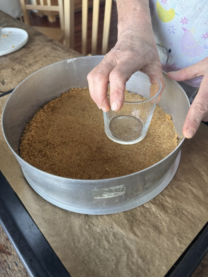 ...and flattening it with the base of a glass.