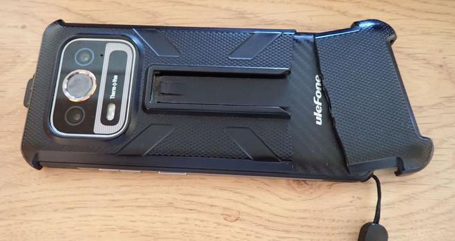 Ulefone Armor 25T phone with original Ulefone case. The phone is fine but the case has broken straight off along a weak line near the bottom where the accessory clip ends.