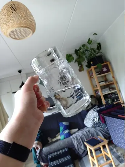 pov im raising a half empty one liter water pint