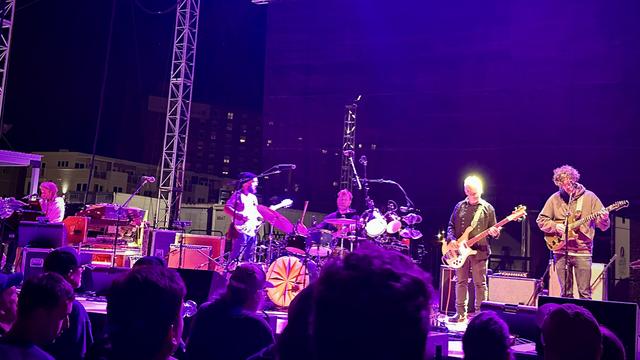 Joe Russo’s Almost Dead performing at the Stone Pony Summer Stage in Asbury Park NJ on Friday May 23, 2025. The band on stage at night being flooded with purple lights.