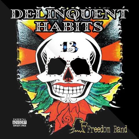 The album cover for "13" by Delinquent Habits features a bold, stylized white skull with a red nose and mouth, black eye sockets, and dotted details. The number "13" is centered on the skull’s forehead in a blue, graffiti-style font. Behind the skull radiates a burst of orange, yellow, and black rays. Surrounding the skull is a background of green and red leaves forming a floral-like design. At the bottom right corner, there’s a gold eagle illustration next to the words “Freedom Band” in an Old English-style font. The top of the cover reads "DELINQUENT HABITS" in large capital letters, and a Parental Advisory label appears in the bottom left corner