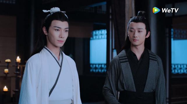 In Chang Manor, Xiao Xingchen and Song Lan stand near each other, about a foot apart, and Song Lan has turned his head to look at Xingchen while Xingchen is looking forward at an offscreen target.