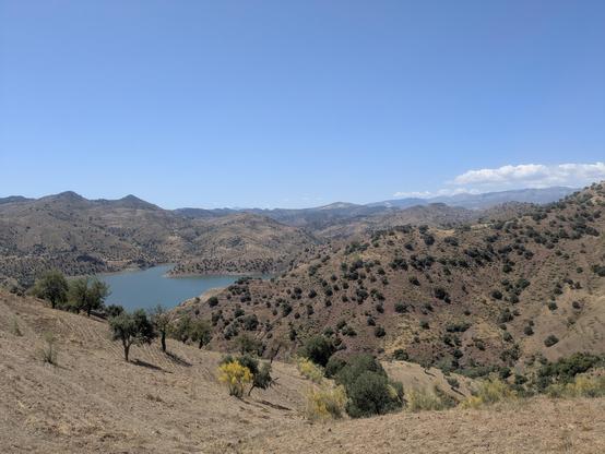 view of a lake and nearby hills