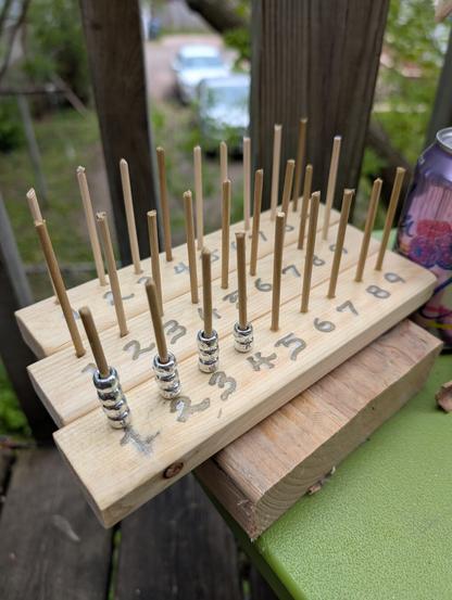 Spell slot trackers for Dungeons and Dragons or any other ttrpg just boards with dowels and pony beads