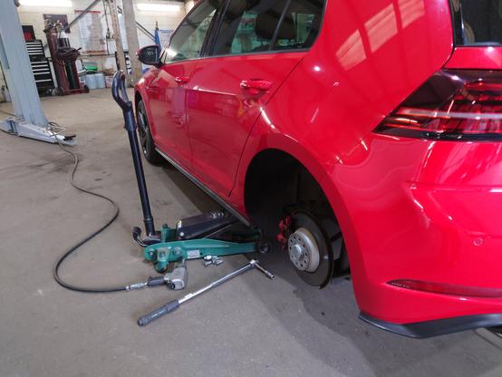 Golf GTI on the jacks at the tyre garage (Hadleigh Tyres in Needham Market, Mid Suffolk)