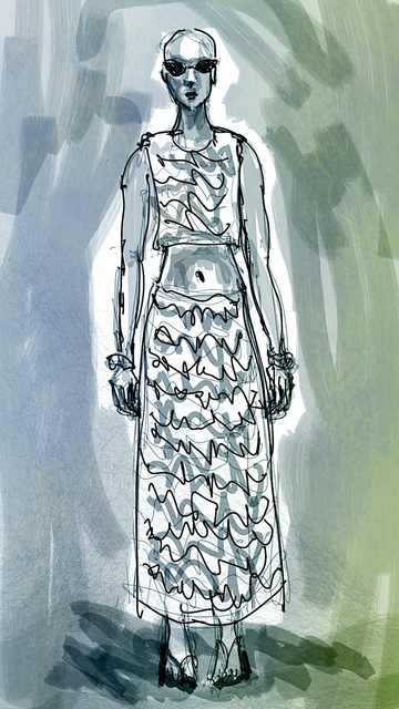 A female mannequin in a two piece outfit: bodice and skirt.