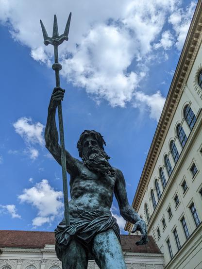 Poseidon Statue in the back yard of an old historic building in Munich