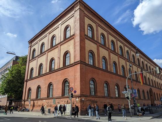 Old corner building in Munich with world war two shooting holes in the facade