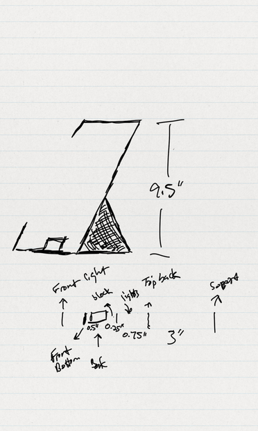 Black and white sketch of a custom bookstand with measurement markers.