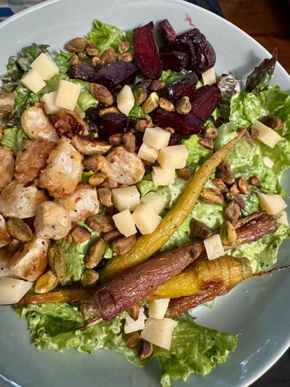 Salad with lettuce, carrots, turnips, beets, & cheese. It’s not that colorful because of roasting.