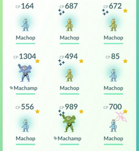A screenshot of nine Pokemon.
1. A random Machop (humanoid pokemon) I didn't transfer yet
2 and 3. Two shinies (green little guys instead of blue)
4. Machamp, evolved version of Machop
5. Another shiny
6 and 7. Two regular Machops (they're the XXS and XXL)
8. Shiny Machamp
9. Random Dynamax Machop from earlier