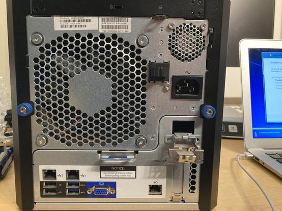 The rear of the HPE microserver. Bottom left:
2 gigabit ethernet ports, 2 usb 3 ports, 2 usb 2 ports, 1 vga port.

Right: a console port and a PCI express 16x half-height card slot.
