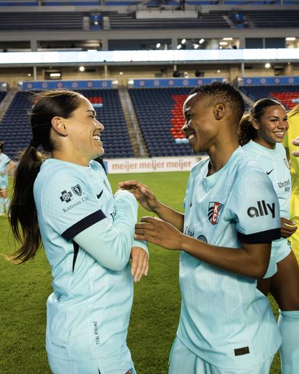 LaBonta and Jereko smiling at each other