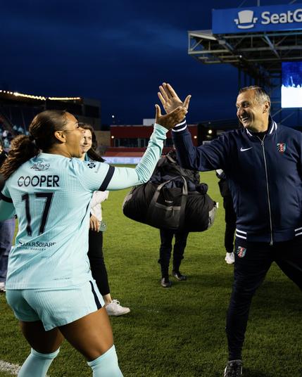 Cooper high fiving Vlatko