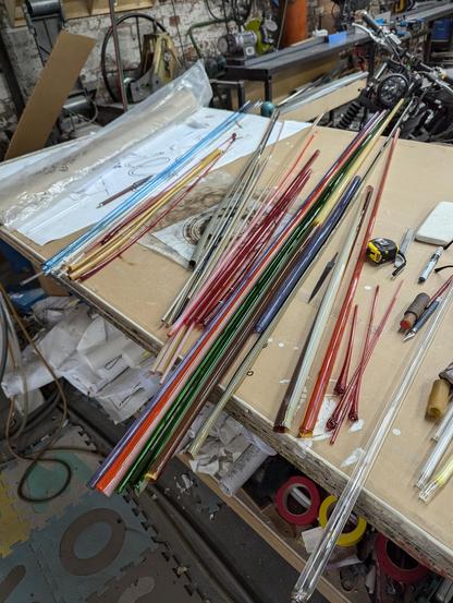 The tubes on the table before coating any of them.