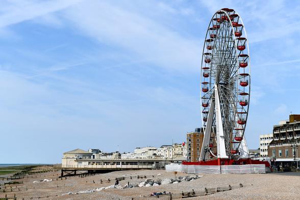 Photo of a 44m high observation wheel being installed for the summer season on Worthing seafront. Operated by City Observations Ltd., built by Fabbri, Italy. Worthing, Sussex, UK.