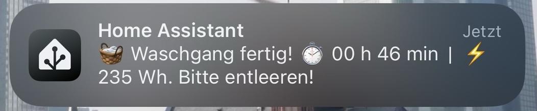 A notification from a home assistant app indicating that a laundry cycle is complete, with a duration of 46 minutes, and a reminder to empty the wash. It also shows energy consumption of 235 Wh.