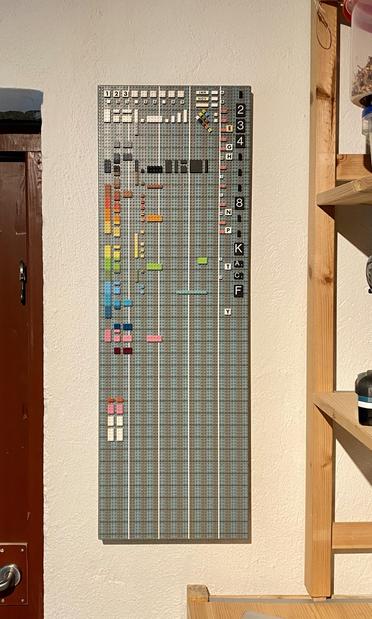 Board hanging on wall. Bottom bracket is not yet installed so the board is a bit loose