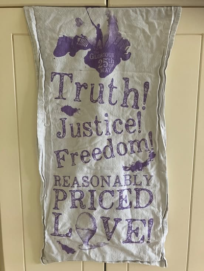 a tea towel with the words; Truth, Justice, Freedom
Reasonably priced Love.
