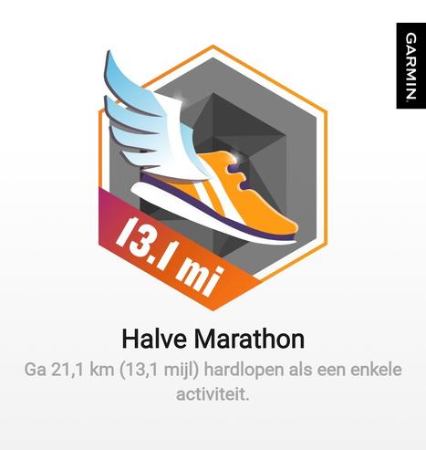 halve marathon bagde uit de Garmin app