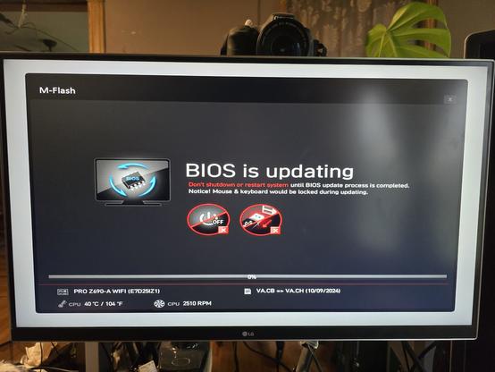 A computer monitor showing a big scary screen.

BIOS IS UPDATING