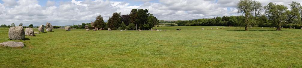 A panoramic image trying (and failing) to capture the entire circle. But maybe about 30-40 stones in the circle are visible.