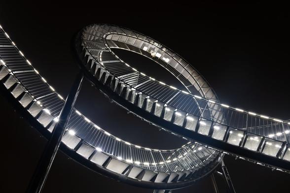 Night shot of the Tiger & Turtle light installation in Duisburg/Germany.