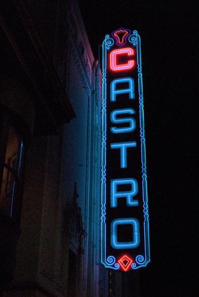 A night photo of the neon Castro Theater sign, captured at high ISO