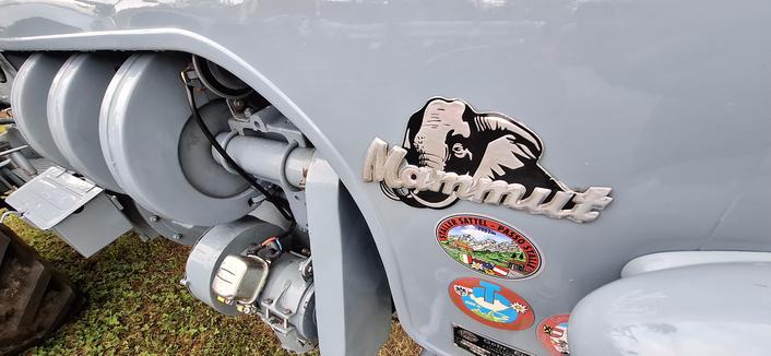 The Eicher Mammut logo on the hood of a tractor.