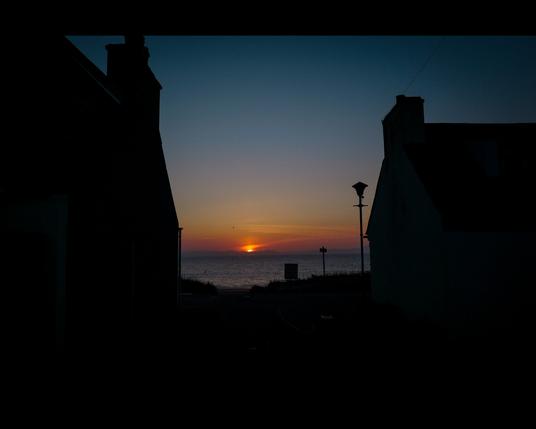 Looking northwest across the Dornoch Firth to the sun setting behind the Sutherland Hills. Taken at about 11.30pm, the sky doesn’t fully darken at this time of year.