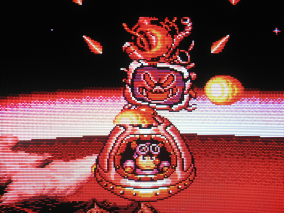 Sparkster re-enters the atmosphere in an escape pod while being chased by an evil CRT.