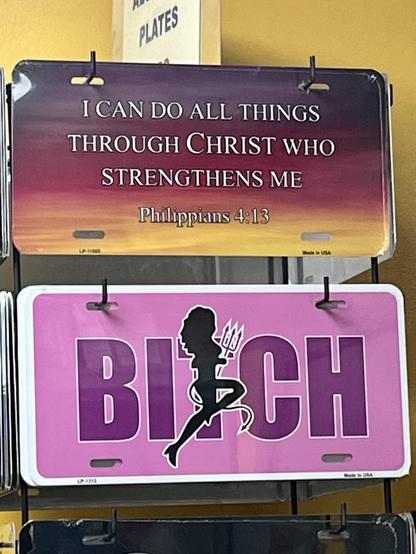 The image features two novelty license plates. One says "I CAN DO ALL THINGS THROUGH CHRIST WHO STRENGTHENS ME" along with a reference to Philippians 4:13. The other says “Bitch” with a devil woman superimposed over the “T”.