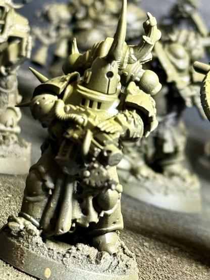 A plague marine, painted a basic green
