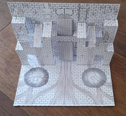 Popup Papierflyer, der einen Dungeon mit Wasserfall darstellt