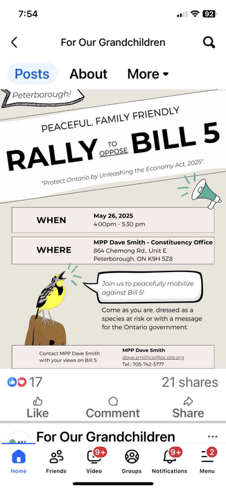 A photo of a rally flyer showing the time of 4:00-5:30 pm for a rally against Bill 5 at 864 Chemong Rd. Peterborough.