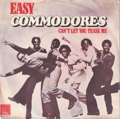 The single sleeve art for Commodores' big hit song "Easy". The band are depicted in a two colour image, all posing standing on one leg and happy.