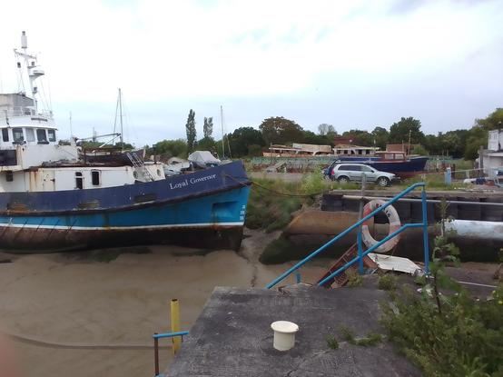 Loyal Governor is the name on the bow of this old coasting ship