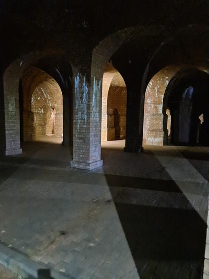 A picture showing the underground water storage structure with amazing vaulted-ceilings, that was used from the 1880 until 1906, when a crack was found in one of the walls, although a reason was never recorded, could have been due to subsidence.
Apparently it holds about 1.5m gallons.

The acoustics were amazing!
Sometimes choirs go to perform down here.