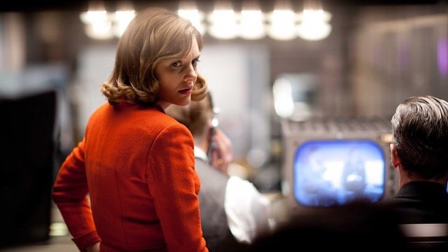 This is a photo of Bel Rowley in a red outfit.