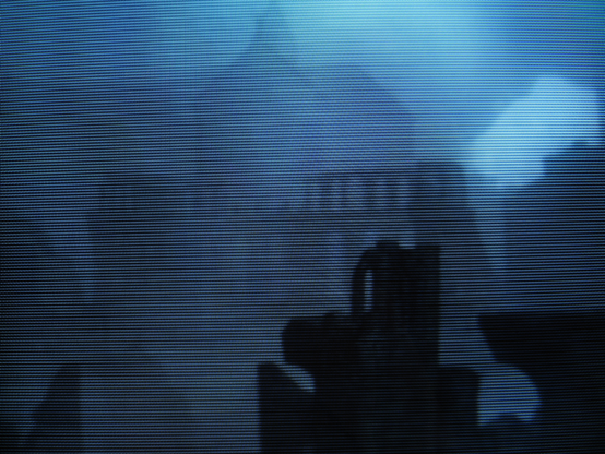 A long-forgotten church in the New Londo Ruins, spookily nestled amongst the fog, lousy with screaming ghosts.